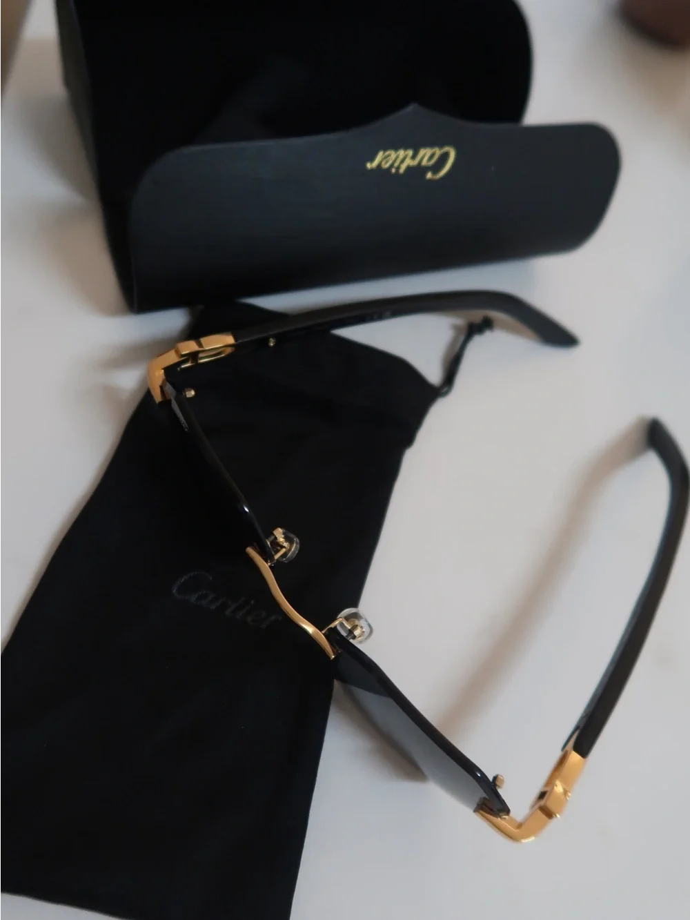 Geometric Rimless Sunglasses — Black & Gold Accents